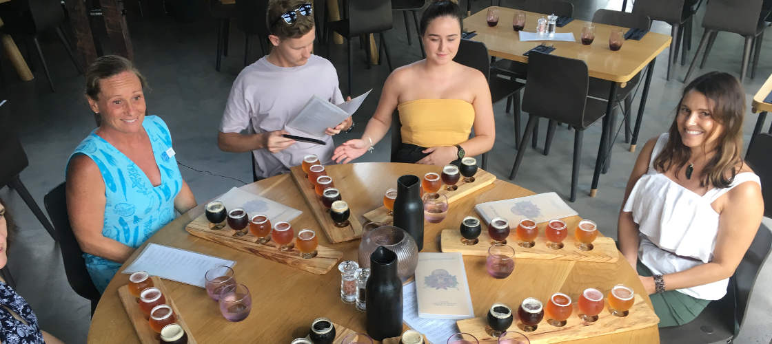 Group of people tasting craft beer on a Sunshine Coast Craft Beer Tour